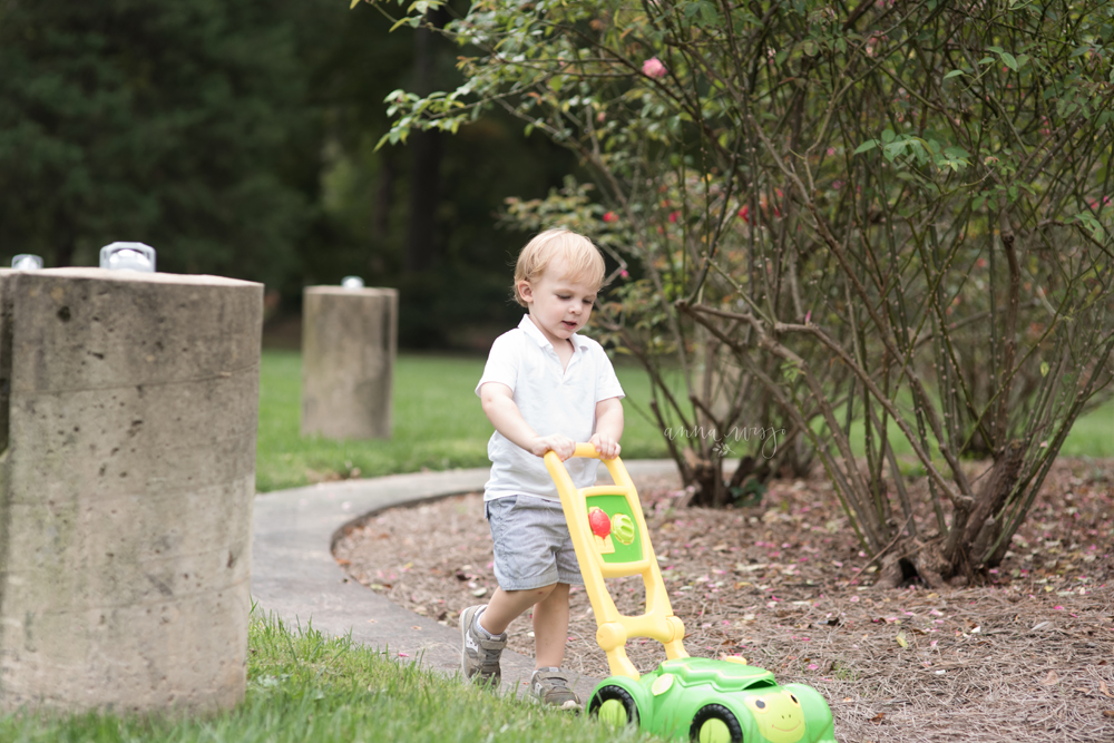 Boy and his lawnmower | Anna Wisjo Photography