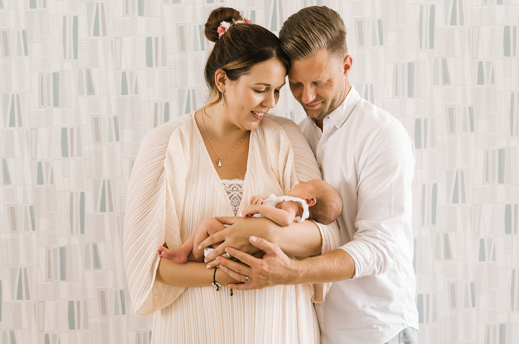 Lifestyle Newborn Session, parents holding baby