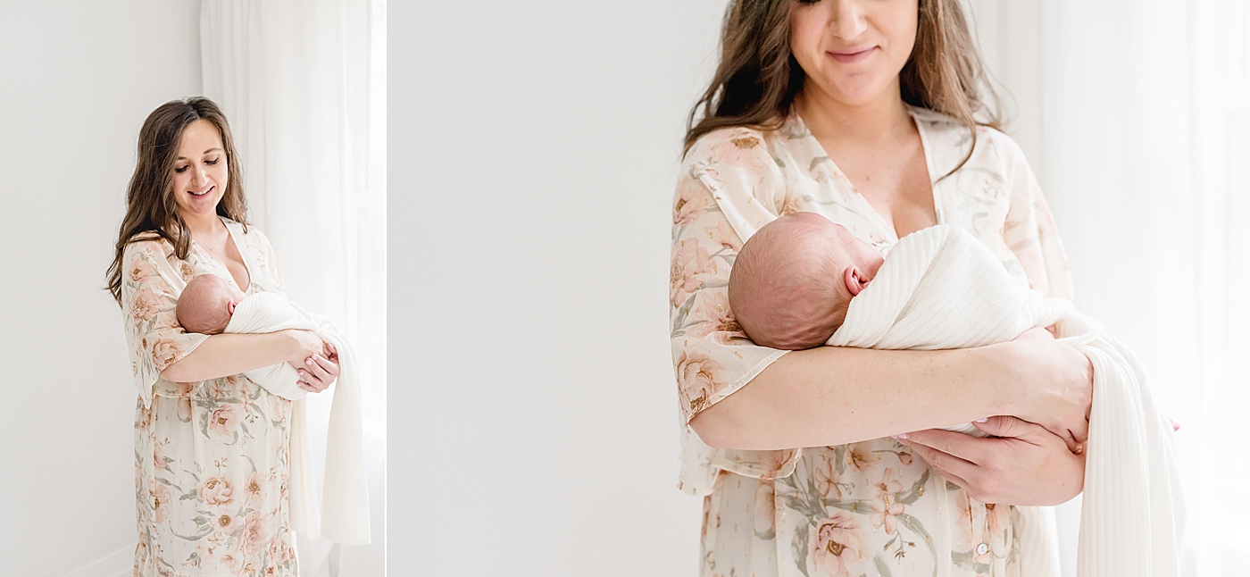 Detail photo of mom in floral dress cradling new baby | Photo by Anna Wisjo Photography
