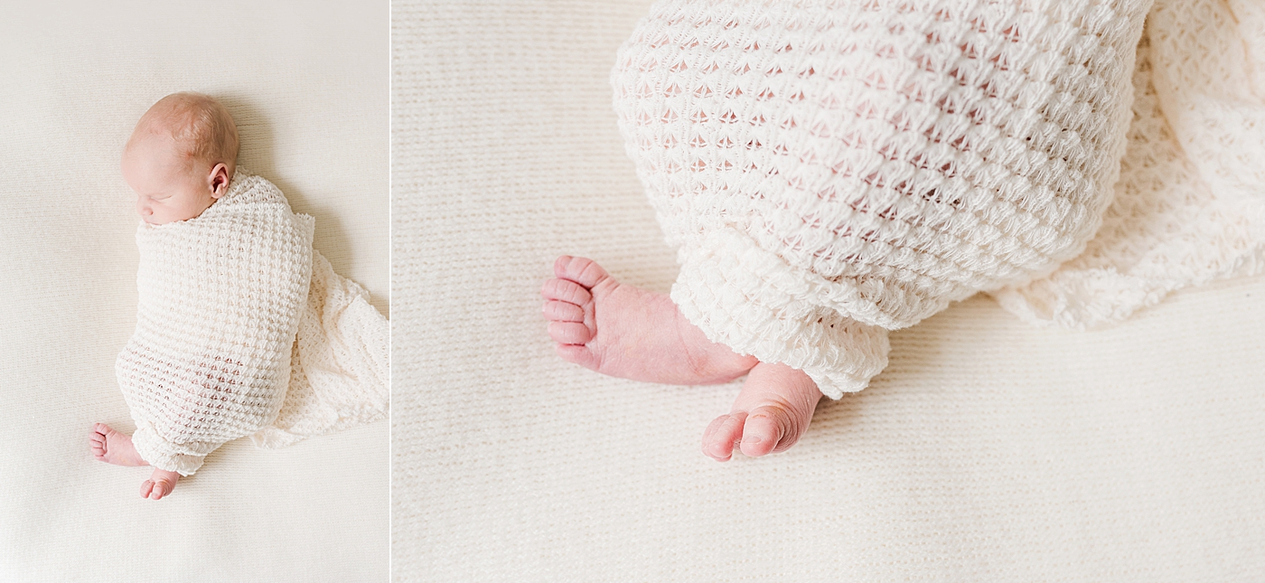Baby boy wrapped in gauzy white swaddle and baby toe details | Photo by Anna Wisjo Photography