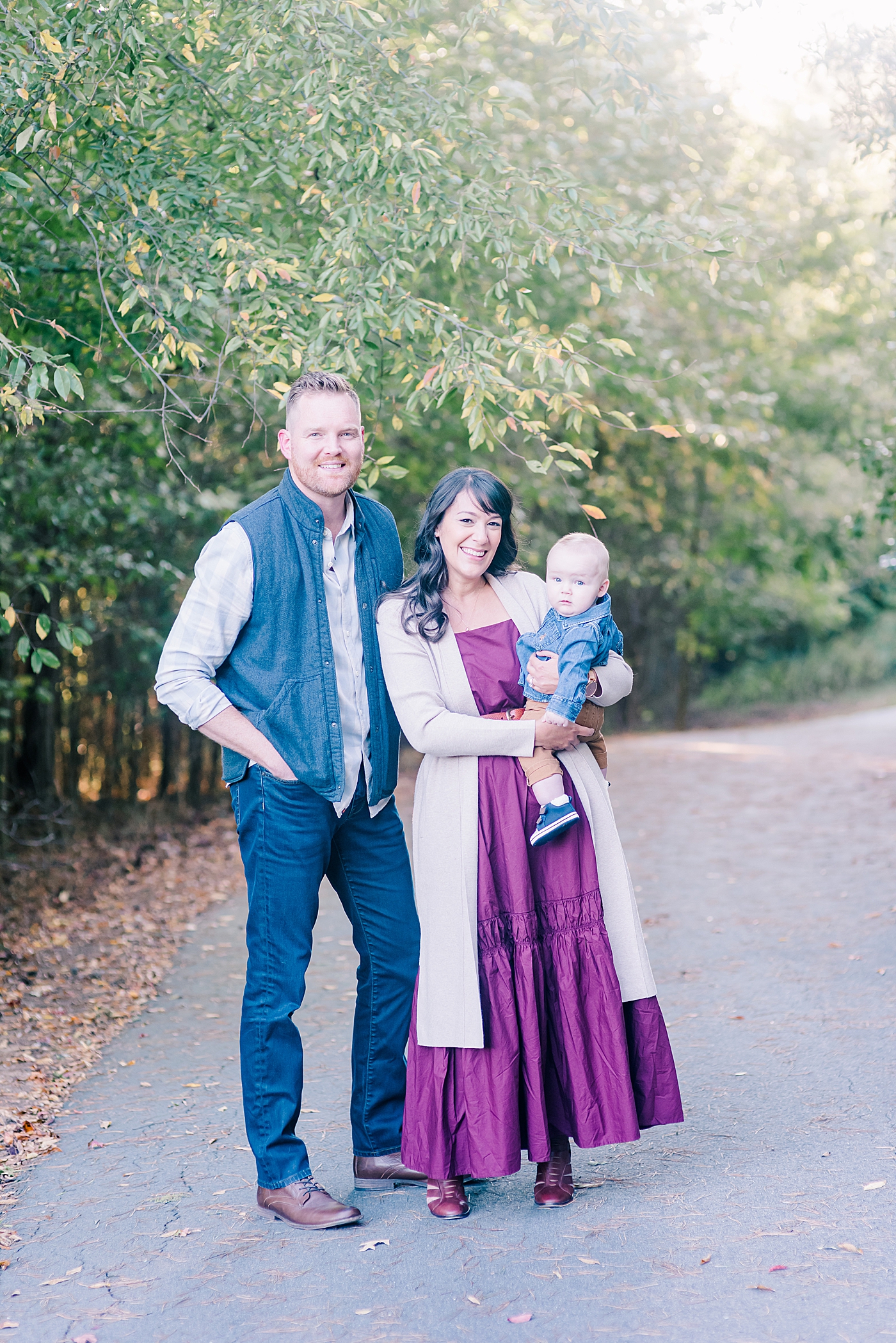 Mom dad and baby smiling | Photo by Davidson Milestone Photographer Anna Wisjo