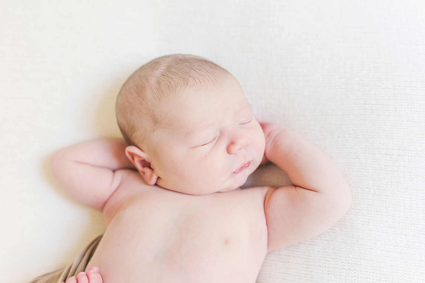 Detail of sleeping newborn baby boy | Photo by Anna Wisjo Photography
