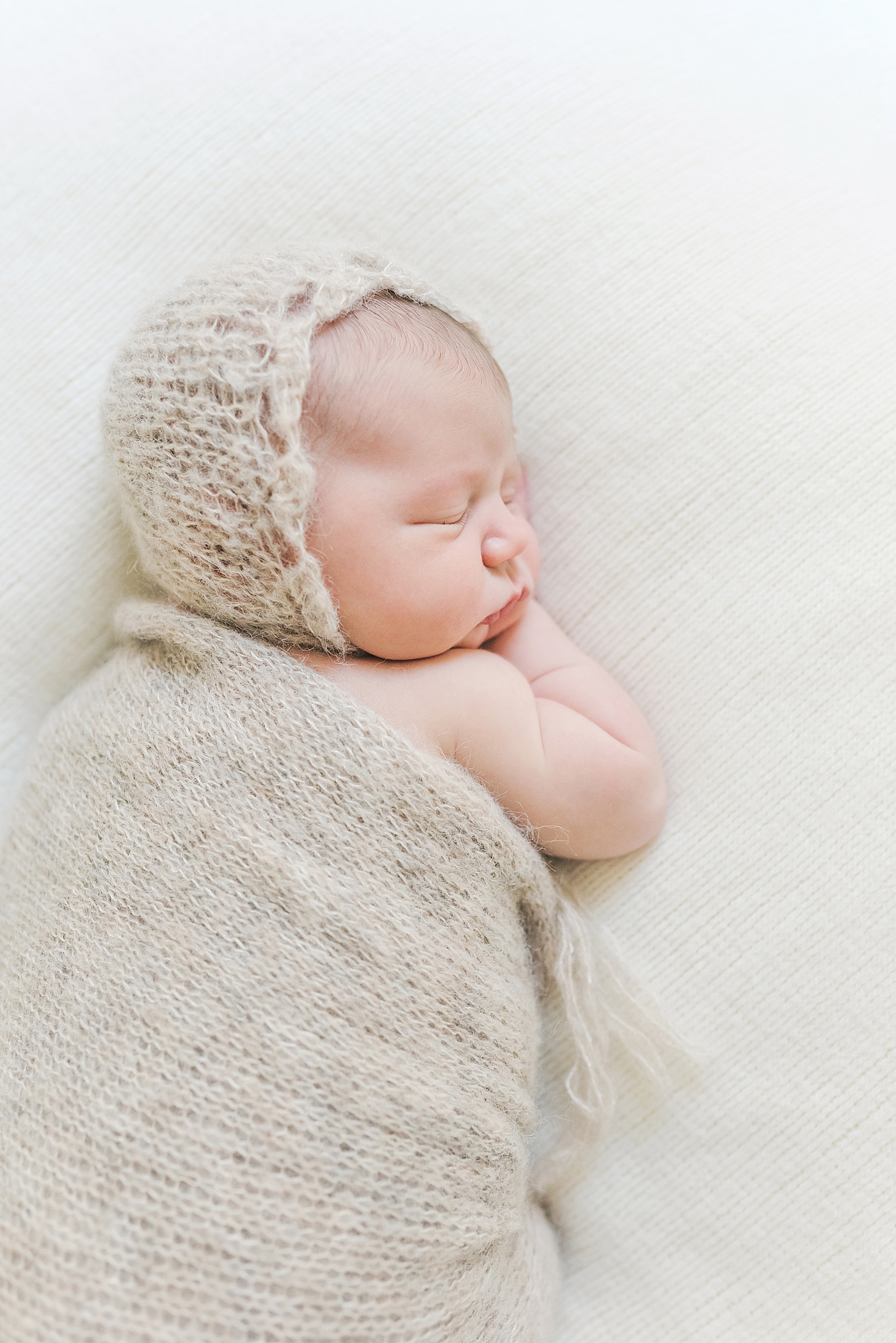 Baby boy in crochet swaddle and bonnet | Anna Wisjo Photography - Baby Photographer Charlotte