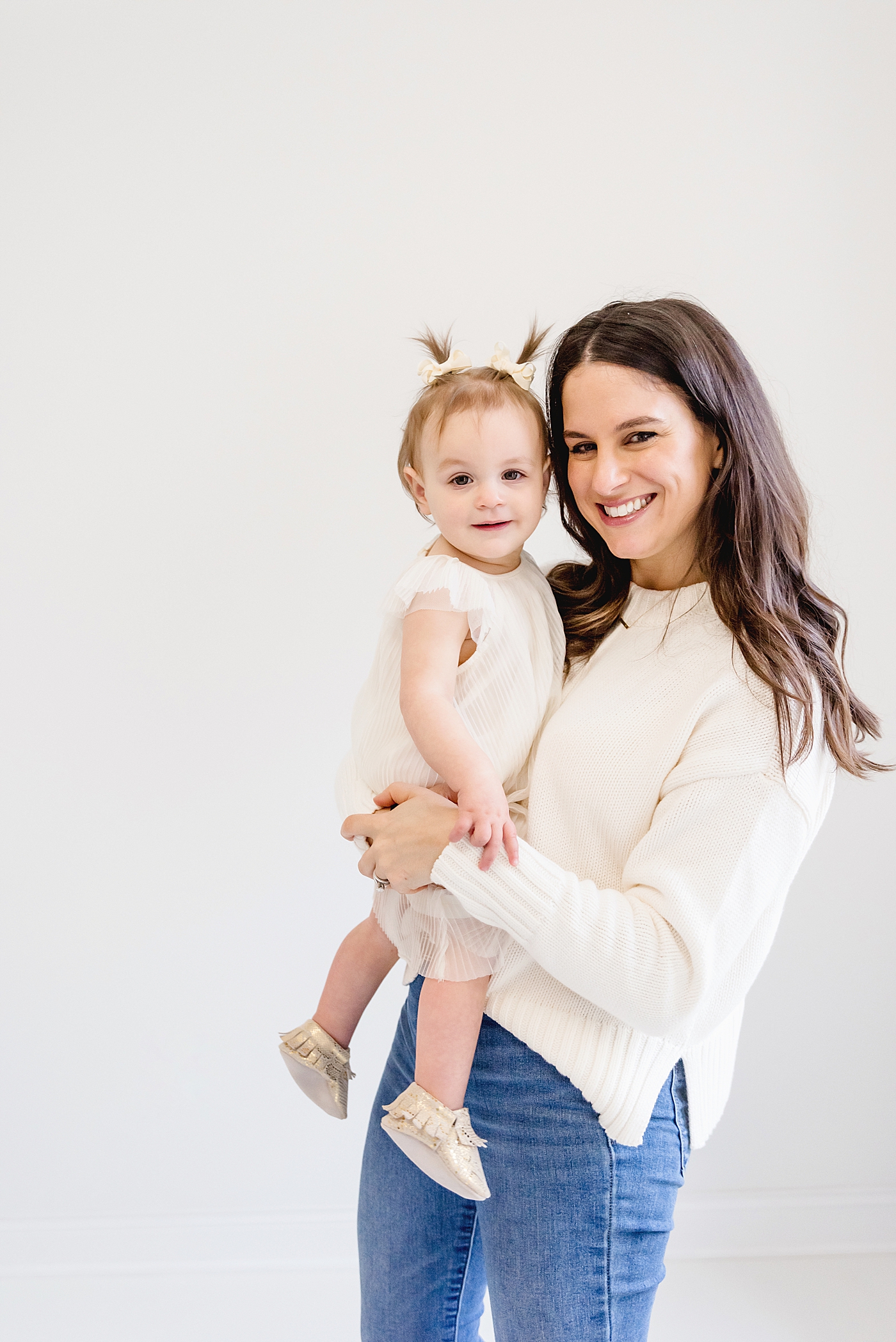 Baby girl in white with pigtails with mom | Baby photographer in Charlotte Anna Wisjo
