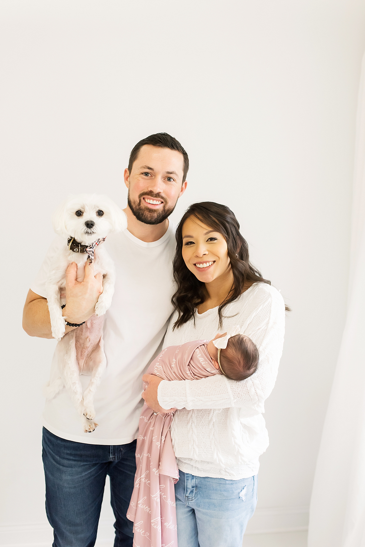 Newborn studio session for family and their new baby including their puppy | Photo by Anna Wisjo Photography